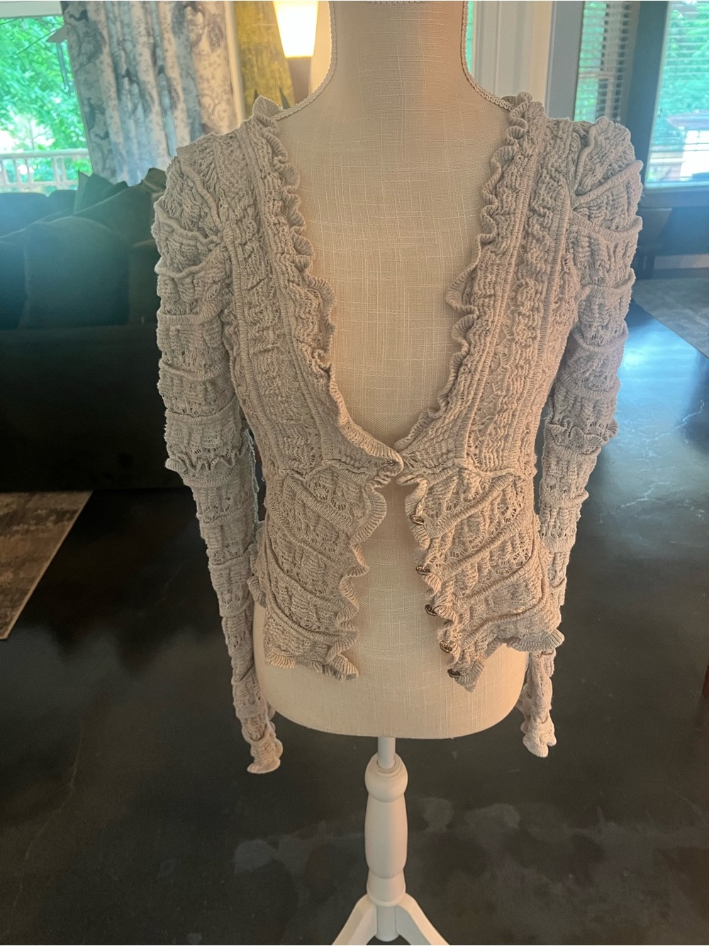 Free People soft cream knit cardigan with ruffle trim